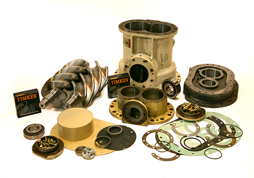 Various disassembled metal engine parts and bearings, including those from Air Centers of Florida, displayed against a neutral background, with the Timken brand visible on some components.